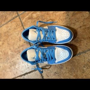 Blue and white Air Jordan 1 low UNC
